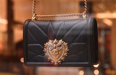 dolce and gabbana purse magnetic snaps fake|false dolce gabbana.